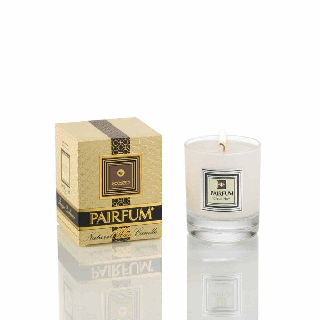 Scented candles for every season, Pairfum's cedar noir candle.