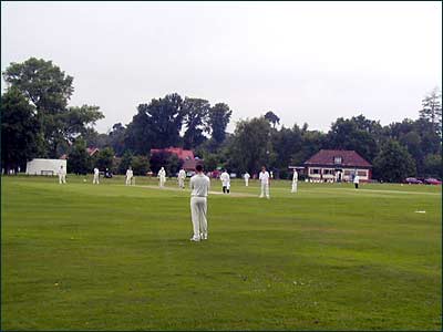 Englefield Green.Cricket In Full Play On The Green