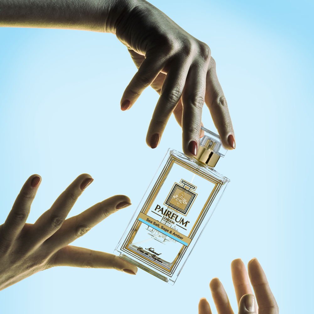 Pairfum Eau De Parfum Bottle Hands Sea Salt Sage Amber Square Wearing Fragrances