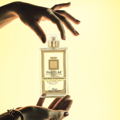 Pairfum Eau de Parfum Bottle Woman Hands Neroli Musk Orange Blossom Square