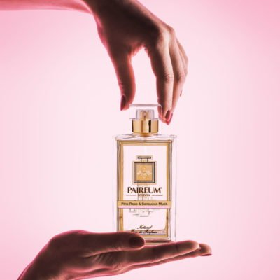 Pairfum Eau de Parfum Bottle Woman Hands Pink Rose Sensuous Musk Square
