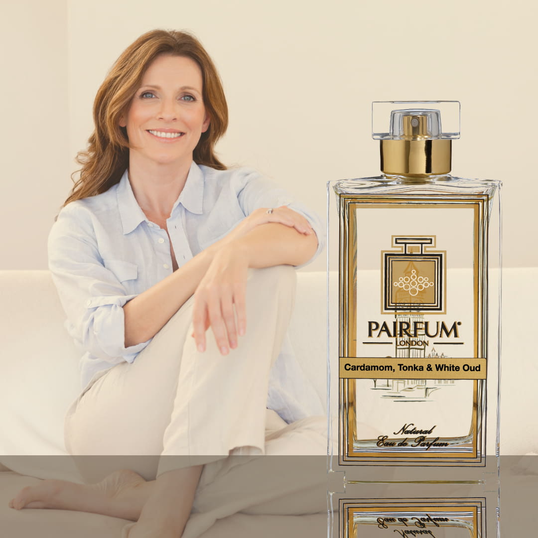 Fragrance Faux Pas: 5 Common Mistakes to Avoid When Wearing Perfume; Eau De Parfum Person Reflection Cardamom Tonka White Oud Woman 1 1