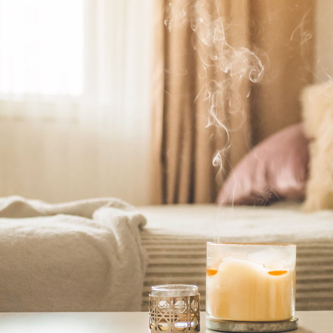 Benefits of scented candles, aromatic candle in a bedroom Luxury candles