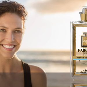 Eau De Parfum Person Reflection Sea Salt Sage Amber Woman Smiling 16 9 Eau De Parfum Person Reflection Sea Salt Sage Amber Woman Smiling 16 9